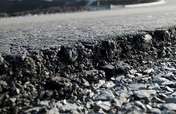 Polymer materials in asphalt